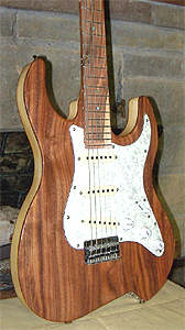 Walnut top with African Olive neck and Pistachio fingerboard by Rock Beach Guitars USA